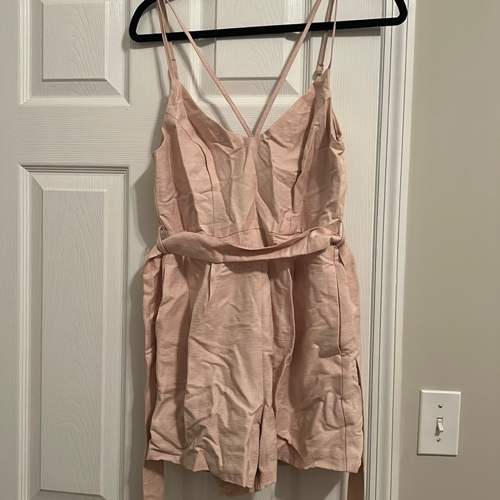 Cute blush romper with tie belt